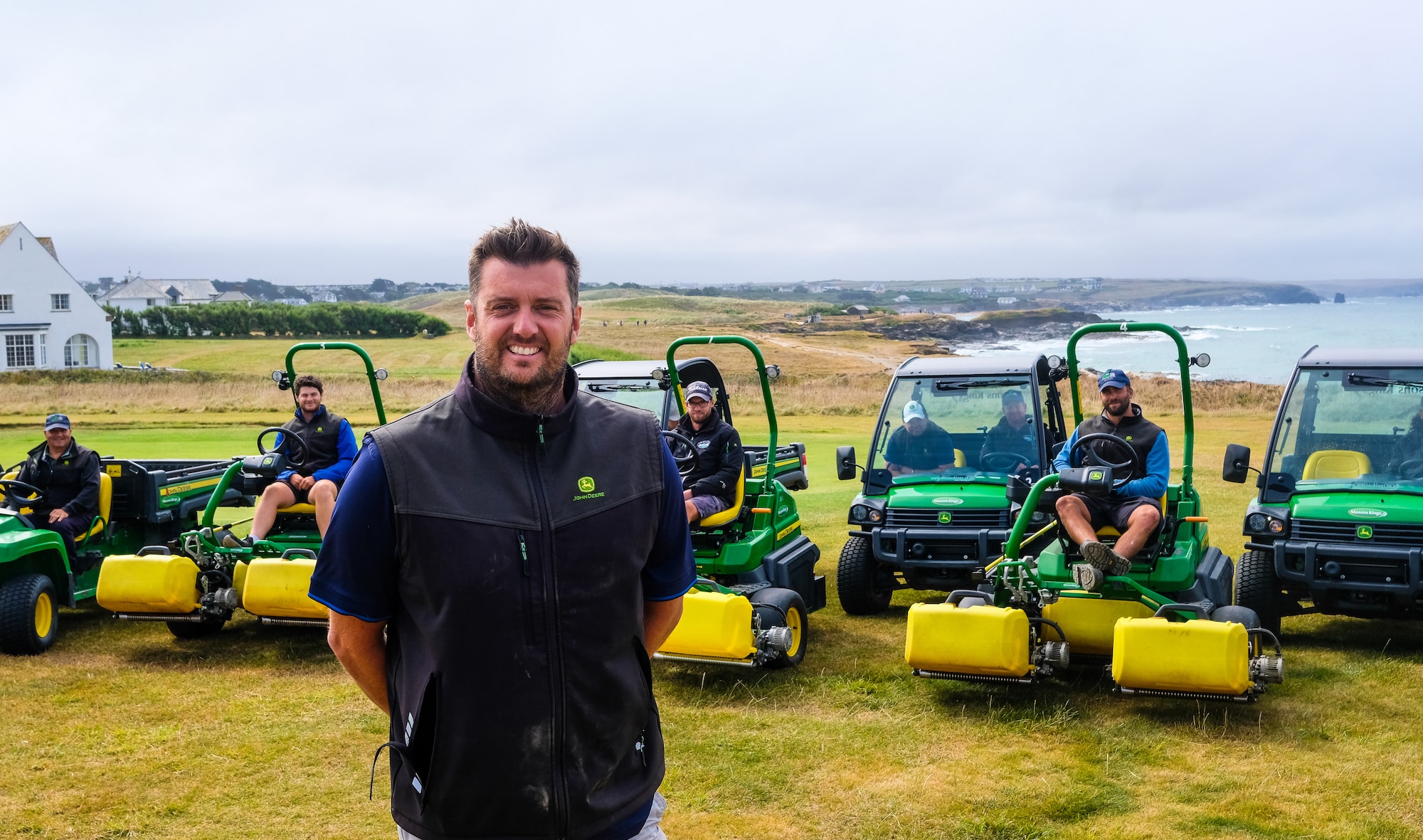 Trevose Golf Club Course Manager Neil Ivamy with his greenkeeping team and their new John Deere fleet 